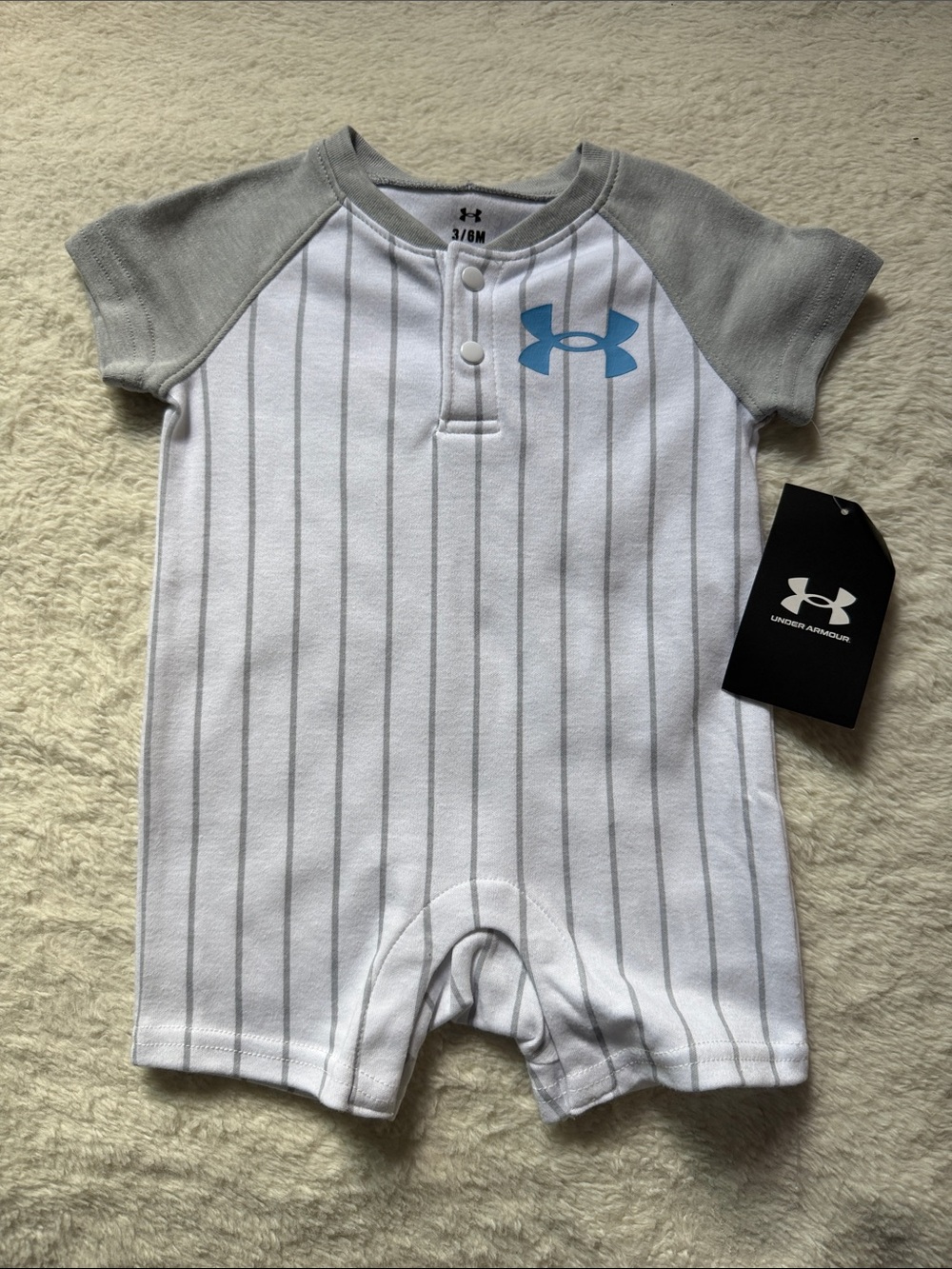 Under Armour White Pinstripe Baby Romper with Gray Sleeves and Blue Logo